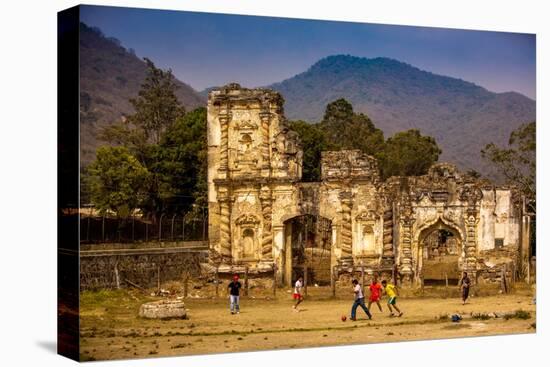 Kids Playing Soccer at Ruins in Antigua, Guatemala, Central America-Laura Grier-Premier Image Canvas