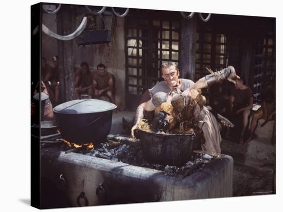 Kirk Douglas Dunking Enemy's Head in Giant Cook Pot in Scene From Stanley Kubrick's "Spartacus"-J^ R^ Eyerman-Premier Image Canvas