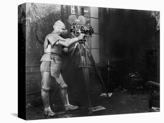 Knight at the Movies, a Man in an Armored Suit Uses a Film Camera-null-Stretched Canvas