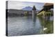 Lake Lucerne, Switzerland. Famous walking bridge and swans in river during the fall season.-Michele Niles-Premier Image Canvas