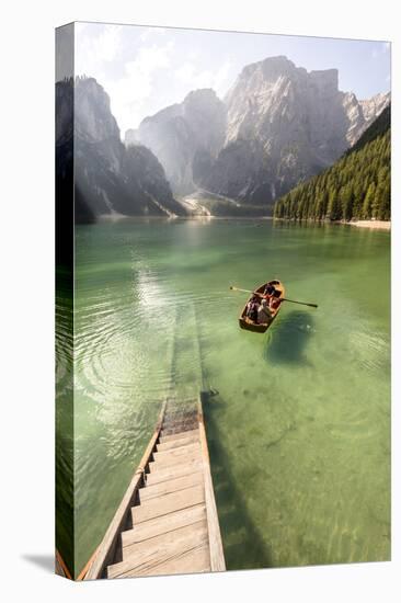 Lake Prags, Prags Dolomites, S Tyrol, Italy: People In Rowing Boat Rowing Out From Rental Station-Axel Brunst-Premier Image Canvas