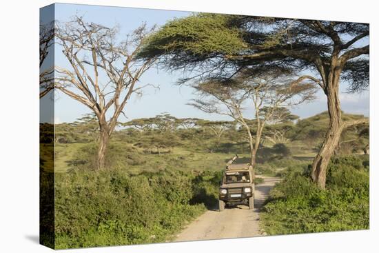 Landscape of the African Savanna with Safari Vehicle, Tanzania-James Heupel-Premier Image Canvas