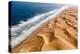 Langewand, Aerial view of where the Atlantic Ocean meets the sea of dunes in Western Namibia.-ClickAlps-Premier Image Canvas