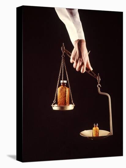 Large and Small Bottles of Generic Pills Being Weighed on Balance Scale-Bill Eppridge-Premier Image Canvas