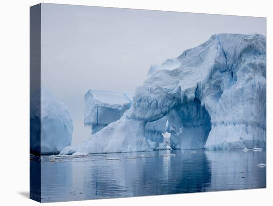 Large iceberg grounded on a reef at Peter I Island, Bellingshausen Sea, Antarctica-Michael Nolan-Premier Image Canvas