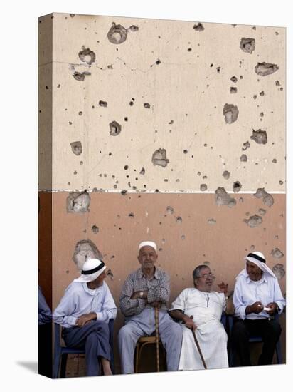 Lebanese Residents Rest in Front of a Wall-null-Premier Image Canvas