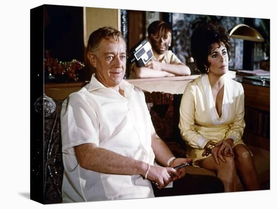 Les Comediens THE COMEDIANS by PeterGlenville with Elizabeth Taylor etAlec Guinness, 1967 (photo)-null-Stretched Canvas