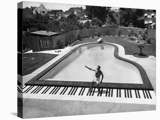 Liberace at the 'Piano' Shaped Pool in His Home-Loomis Dean-Premier Image Canvas