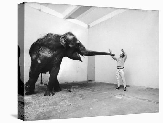 Life Photographer Arthur Schatz with Elephant While Shooting Story on the Franklin Park Zoo-Arthur Schatz-Premier Image Canvas