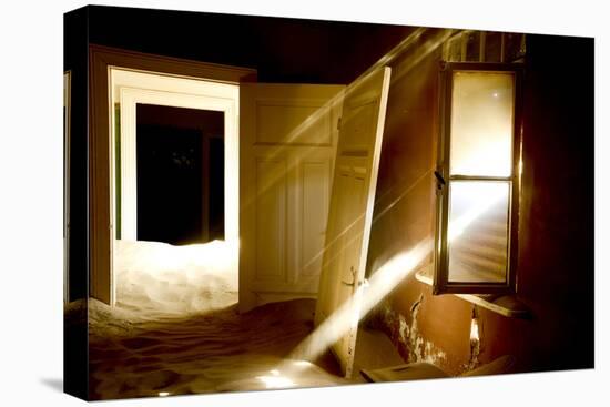 Light Streaming Through Window On Sand Covered House In Kolmanskop Ghost Town-Enrique Lopez-Tapia-Premier Image Canvas