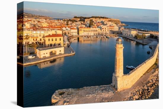 Lighthouse at the Venetian harbor with a view of Venetian Fortezza, Rethymno, Crete, Greek Islands-Markus Lange-Premier Image Canvas