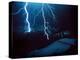 Lightning During a Storm over Snowy Mountains-null-Stretched Canvas