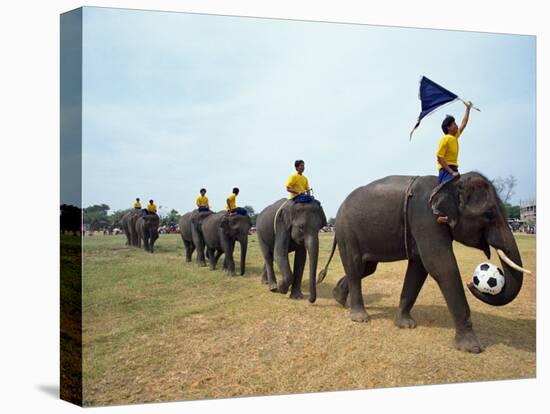 Line of Elephants in a Soccer Team During November Elephant Round-Up Festival, Surin City, Thailand-Alain Evrard-Premier Image Canvas