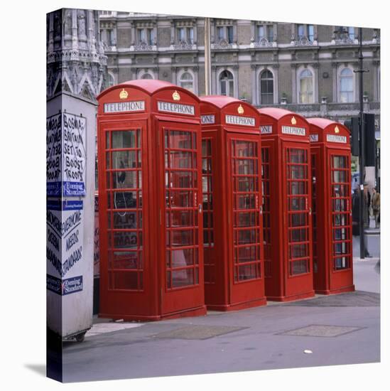 Line of Four Red Telephone Boxes at Charing Cross, London, England, United Kingdom, Europe-Roy Rainford-Premier Image Canvas