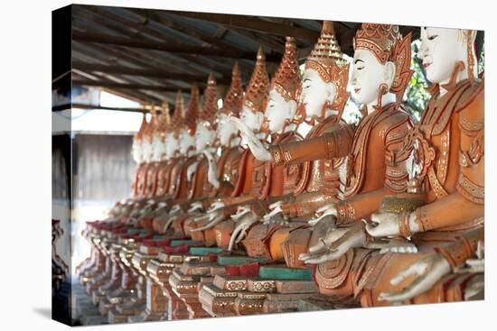 Line of Seated Buddhas at the Maha Bodhi Ta Htaung Monastery, Sagaing Division, Myanmar (Burma)-Annie Owen-Premier Image Canvas