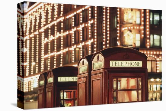 Lit Telephone Booth at Harrods, Knightsbridge, London, England-Walter Bibikow-Premier Image Canvas