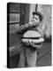 Little Boy Holding Loaves of Bread-Walter Sanders-Premier Image Canvas