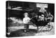 Little Boy Pushing Wheelbarrow of Coal - Elkhart, IN-Lantern Press-Stretched Canvas