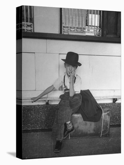 Little Boy Sitting on His Luggage While Waiting For the Train at the Denver Union Station-Sam Shere-Premier Image Canvas