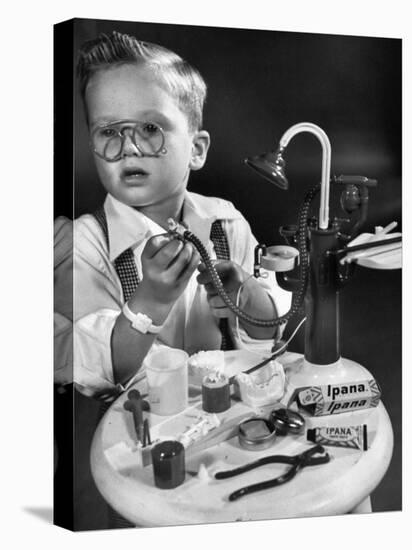 Little Boy with a Toy Dentist Set-Walter Sanders-Premier Image Canvas