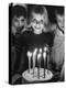 Little Girl Blowing Out Her Candles on Her Birthday Cake-Robert W^ Kelley-Premier Image Canvas