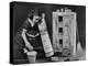 Little Girl with a Toy House Cleaning Kit-Walter Sanders-Premier Image Canvas