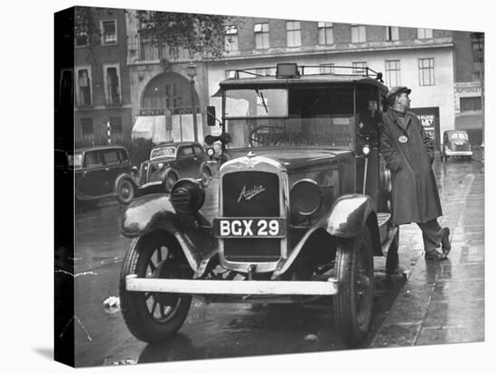 London Taxis-Hans Wild-Premier Image Canvas