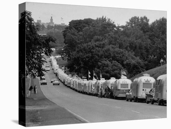 Long Line of Airstream Trailers Wait for Parking Space at a Campground During a Trailer Rally-Ralph Crane-Premier Image Canvas