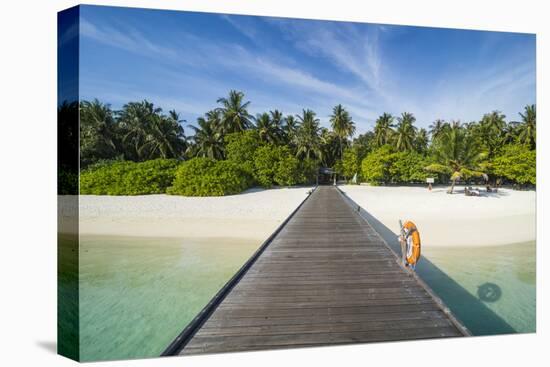 Long pier leading to a small island over turquoise water, Sun Island Resort, Nalaguraidhoo island,-Michael Runkel-Premier Image Canvas