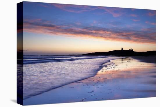 Looking across Embleton Bay at Sunrise Towards the Silhouetted Ruins of Dunstanburgh Castle-Lee Frost-Premier Image Canvas