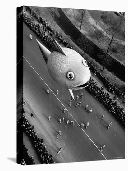 Looking Down Onto Fish Balloon and Crowds Lining Street During Macy's Thanksgiving Day Parade-John Phillips-Premier Image Canvas