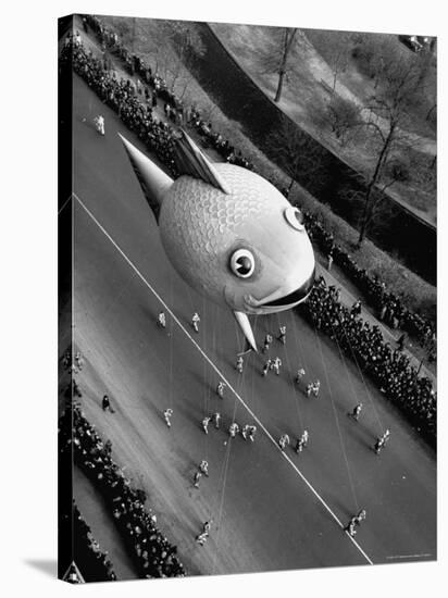 Looking Down Onto Fish Balloon and Crowds Lining Street During Macy's Thanksgiving Day Parade-John Phillips-Premier Image Canvas