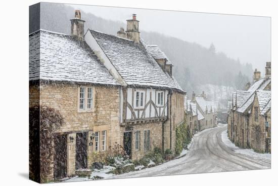 Looking down the quintessential English village of Castle Combe in the snow, Wiltshire, England, Un-Paul Porter-Premier Image Canvas