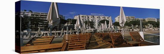 Lounge Chairs and Beach Umbrellas on the Beach, Cannes, Alpes-Maritimes, Provence-Alpes-Cote D'A...-null-Premier Image Canvas