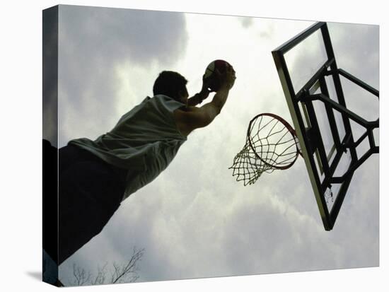 Low Angle View of a Man Shooting a Basket-null-Premier Image Canvas