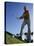 Low Angle View of a Senior Man Swinging a Golf Club-null-Premier Image Canvas