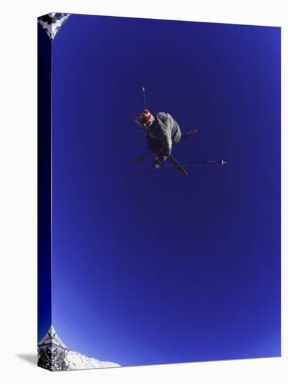 Low Angle View of a Skier in Mid Air-null-Premier Image Canvas