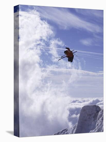 Low Angle View of a Skier in Mid Air-null-Premier Image Canvas