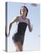Low Angle View of a Woman Running-null-Premier Image Canvas