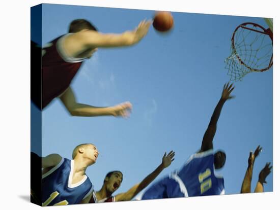 Low Angle View of Group of Young Men Playing Basketball-null-Premier Image Canvas