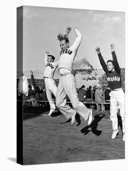 Male Cheerleaders in Action at Wisconsin-Marquette Football Game-Alfred Eisenstaedt-Premier Image Canvas