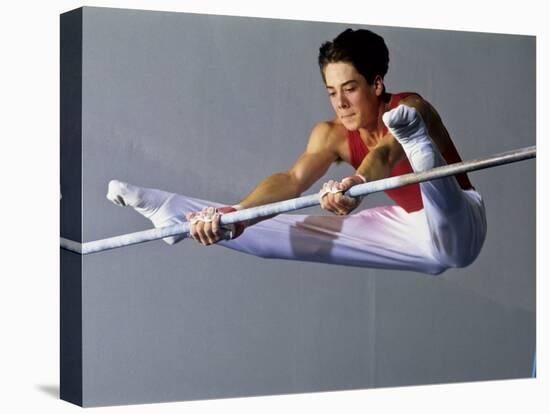 Male Gymnast Performing on the Horizontal Bar-null-Premier Image Canvas