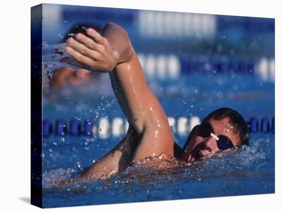 Male Swimmer Competing in a Freestyle Race-null-Premier Image Canvas