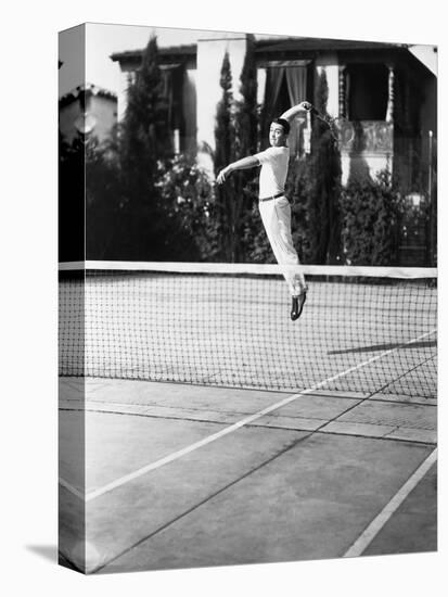 Male Tennis Player Jumping for Shot-null-Stretched Canvas