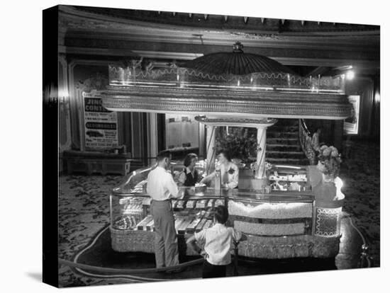 Man Buying Snacks at the Movie Concession Stand-Peter Stackpole-Premier Image Canvas