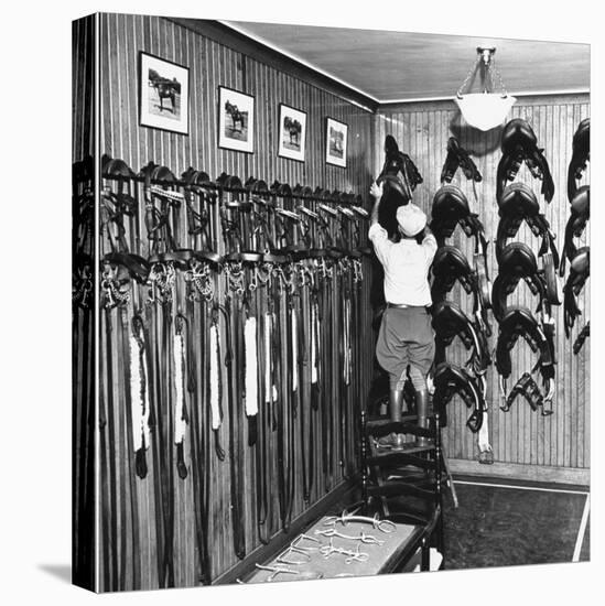 Man Checking Equipment Inside a Stable's Tack Room-Alfred Eisenstaedt-Premier Image Canvas