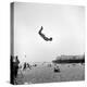Man Flying Off a Trampoline at Santa Monica Beach-Loomis Dean-Premier Image Canvas