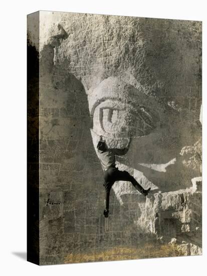 Man Hangs Onto Eye at Mount Rushmore-null-Premier Image Canvas