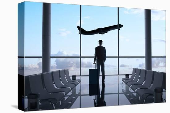 Man in Airport-g_peshkova-Premier Image Canvas