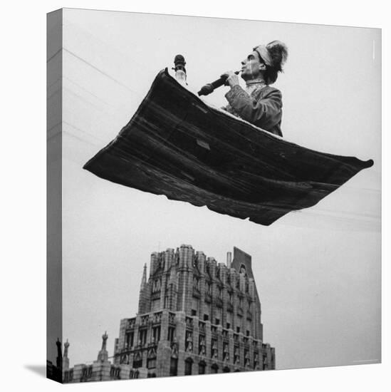 Man in Arabic Dress, Smoking a Water Cooled Pipe, is Comfortably Sitting on a Magic Carpet-Andreas Feininger-Premier Image Canvas